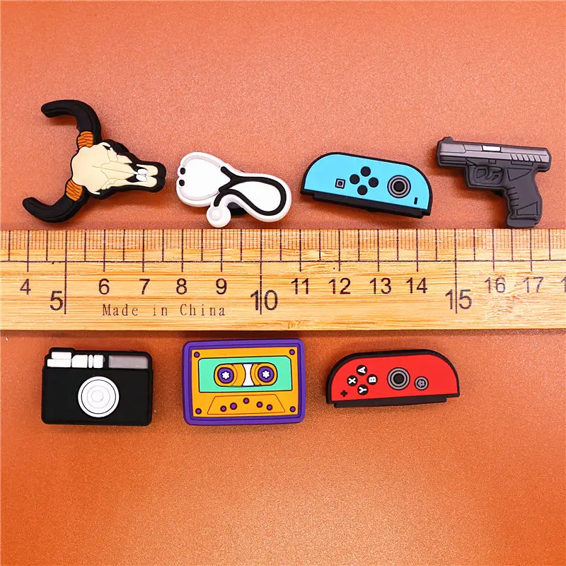 Freeshipping 1pcs Stethoscope Shoe Charms Pistol Camera Audiotape PVC Shoe Accessories Decoration Fit Croc Jibz Party Kids Gifts