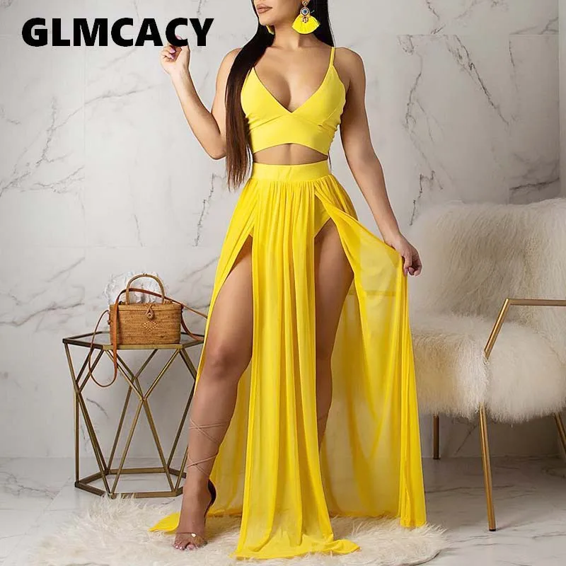 Женское платье с высоким разрезом и глубоким v образным вырезом асимметричное на
