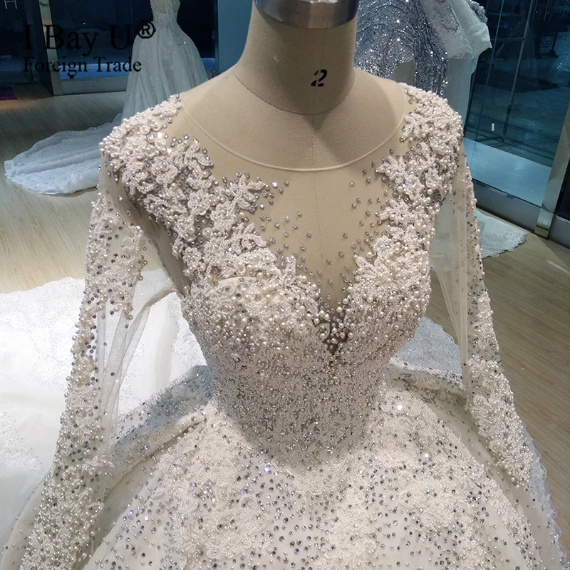 Роскошные свадебные платья с длинным рукавом украшенные камнями 2020