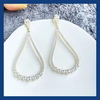 the new creative pearl fashion earrings for women bohemia long section alloy inlaid pearl personality earrings 2021
