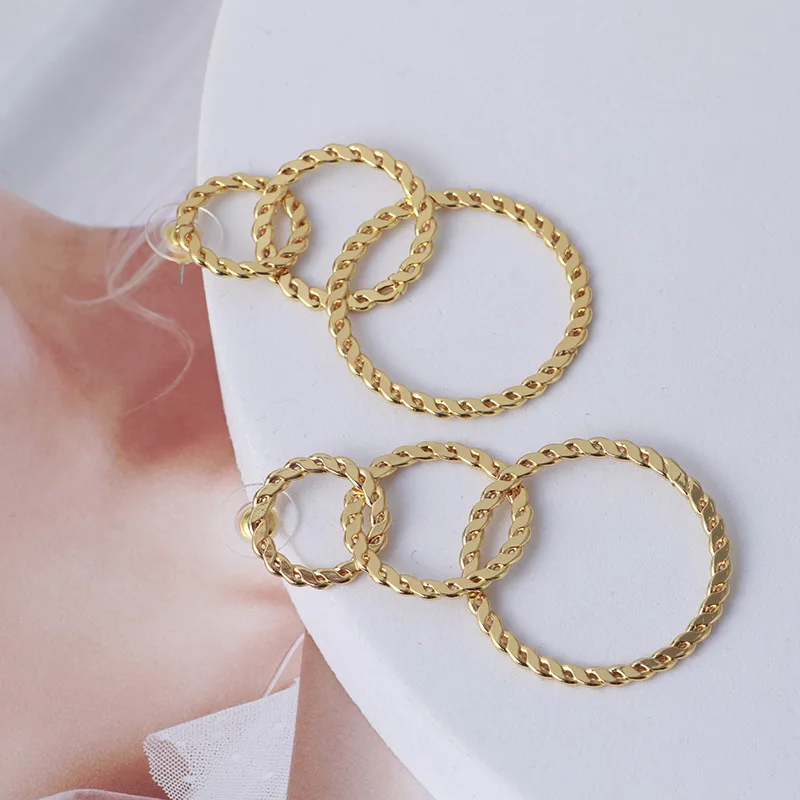 

Simple stitching interlaced woven ring personalized metal texture earrings