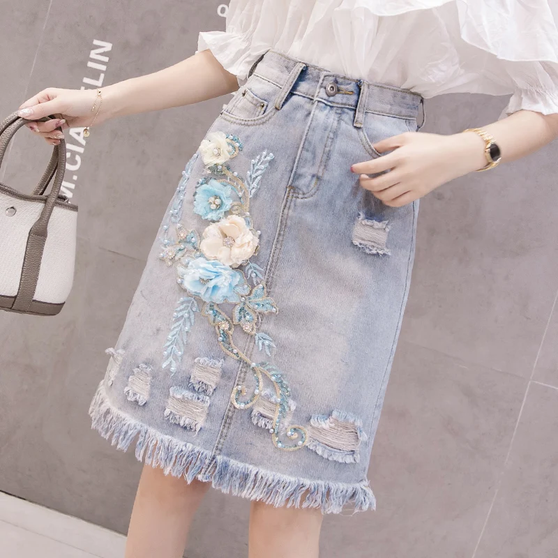 

Women flower embroidery denim Skirts fashion High Waist A-Line High Waist Falda Mujer Vintage fringed Female ripped Skirt