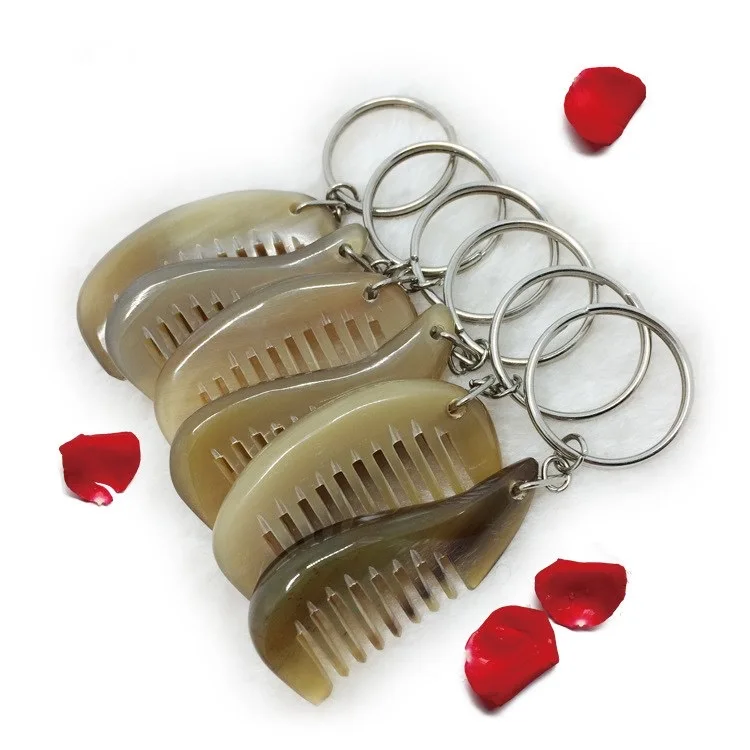 

Natural consumption horn keychain horn comb bag pendant pendant sharp horn comb health comb Creative gift