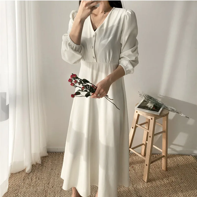 Однобортное платье с V-образным вырезом тонкой талией и плиссированной юбкой |