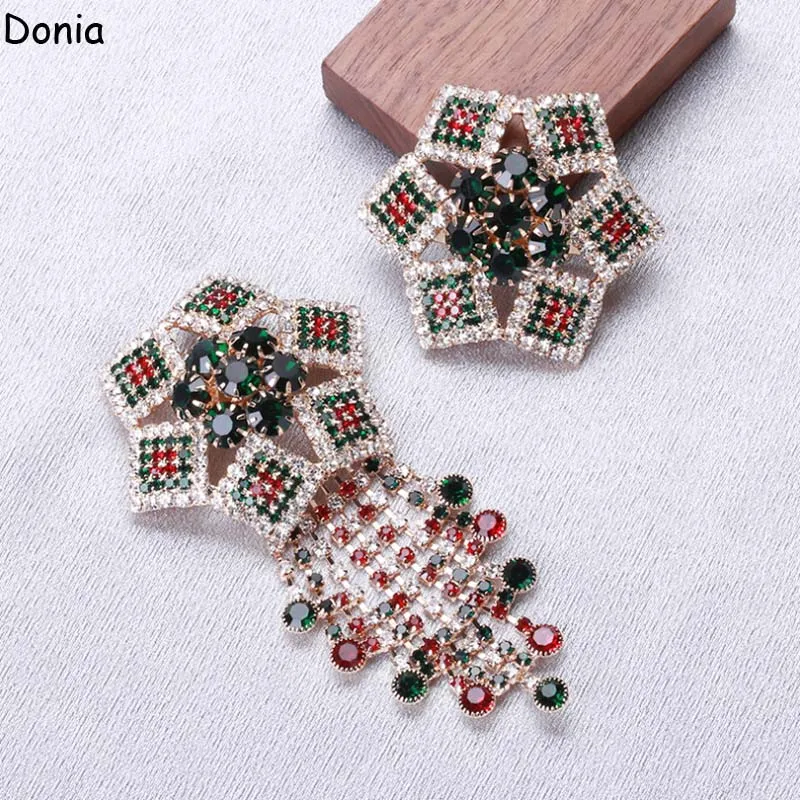 

Donia jewelry European and American fashion new claw chain hollow five-pointed star brooch color fashion Joker ladies pin