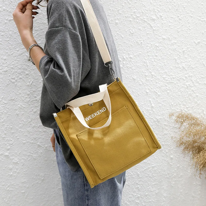 

2019 new summer Korean canvas bag female high-capacity student lunch bag Japanese alphabet messenger handbag printed canvas bag