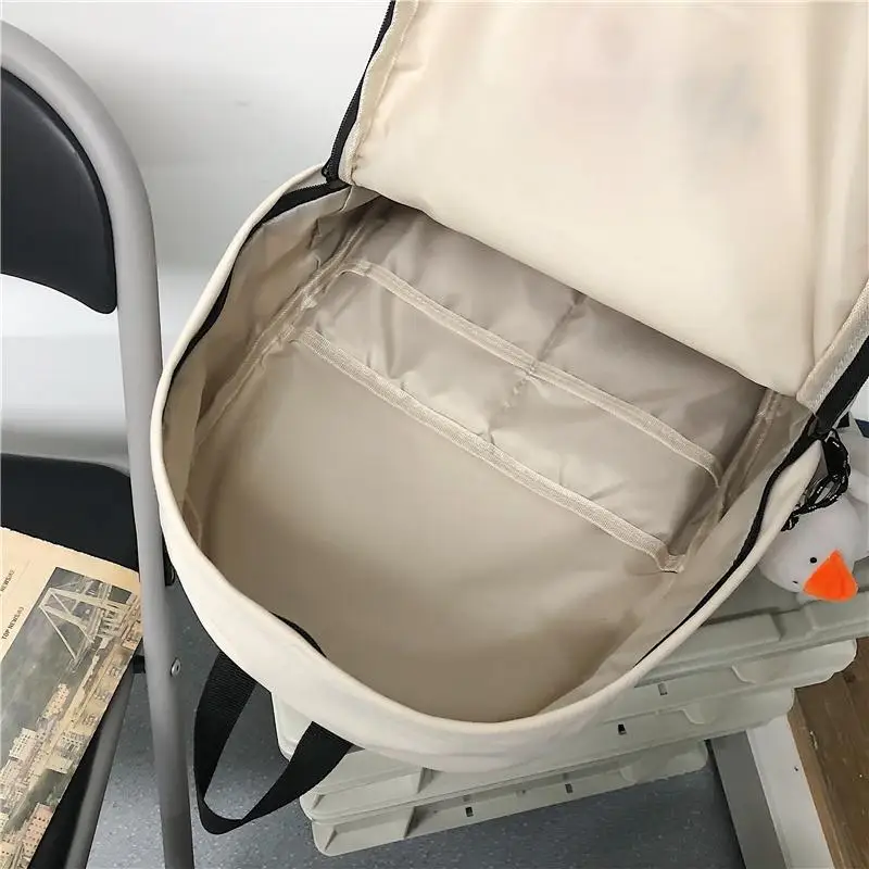 

Unisex Large capacity backpack Nylon Waterproof Pure color School bags for middle and high school students Fashion travel bag