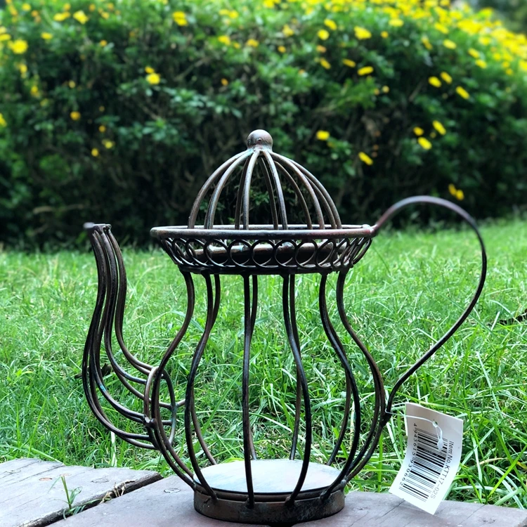 

vintage retro metal teapot planter idea
