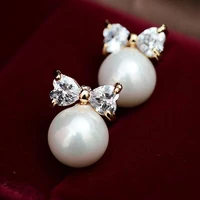 huitan simple fashion imitation pearl stud earrings girls gold color bow aesthetic jewelry hot sale earring for women drop ship