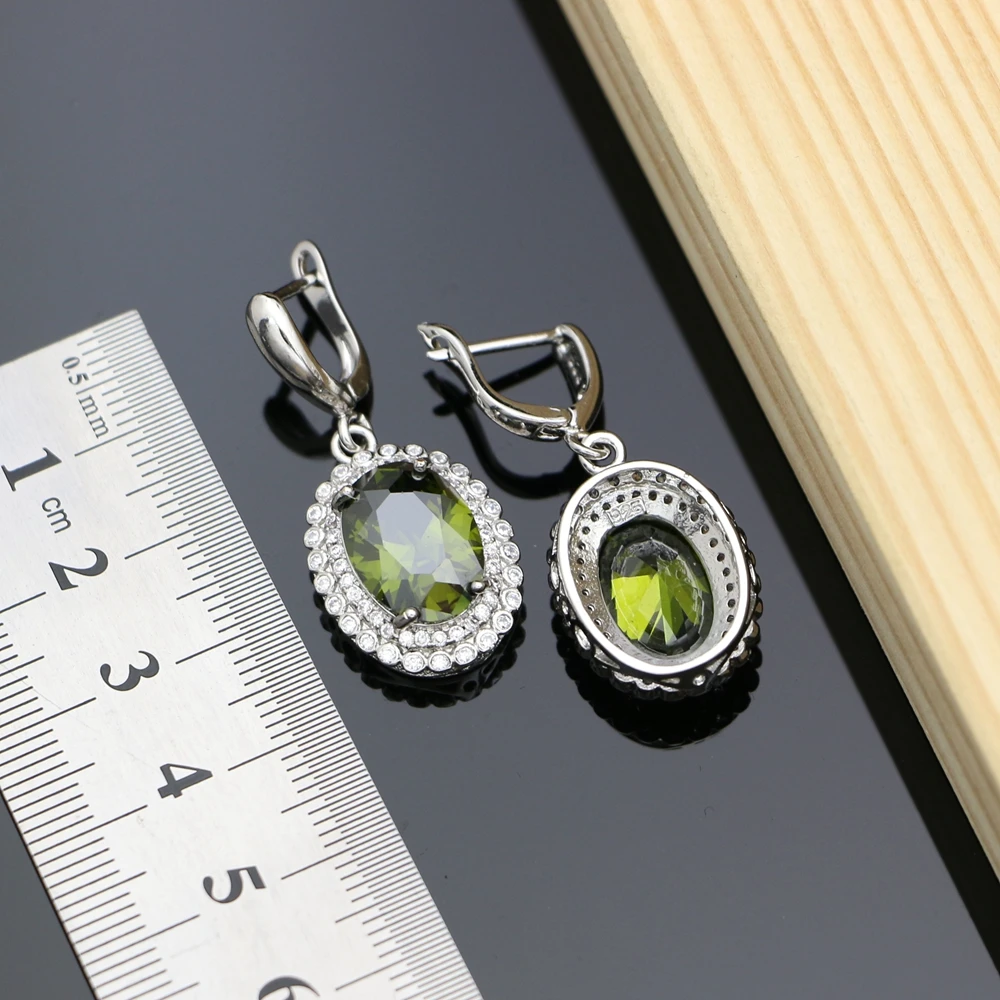 Серьги с оливково-зеленым камнем ювелирные изделия из серебра кубическим