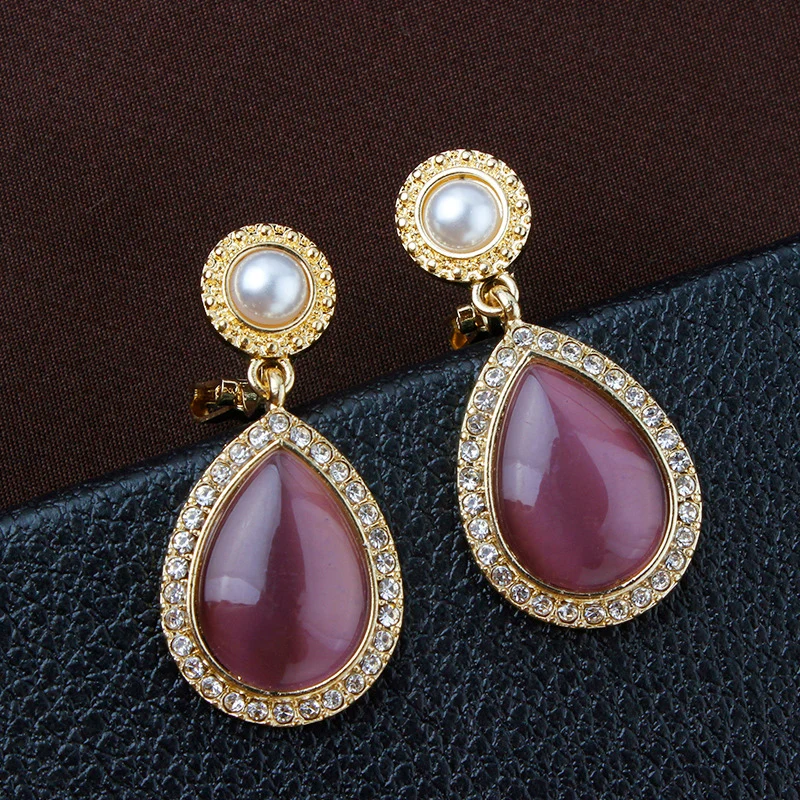 

Серьги-клипсы женские с камнем «кошачий глаз»