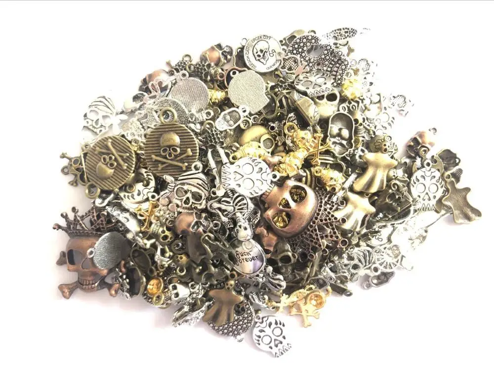 

Hot sale 100g zinc alloy metal mixed Skull pendant antique bronze bracelet necklace DIY jewelry crafts wholesale accesso