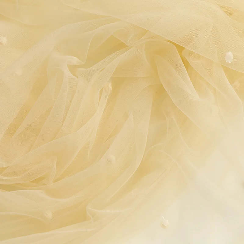 Марлевая ткань абрикосовая мягкая пряжа кружевная ручной работы фон свадебного