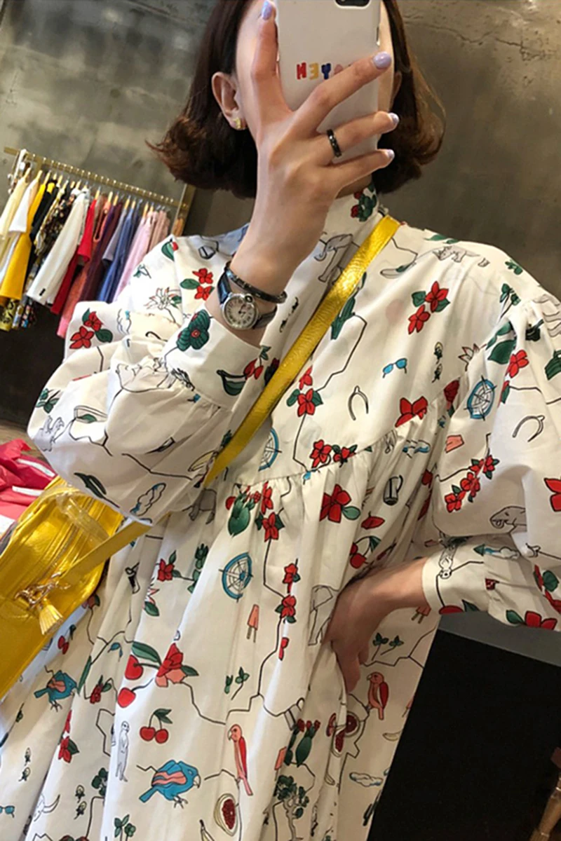 

Korea chic early autumn age reduction cartoon graffiti print stand collar loose puff sleeve large swing dress female