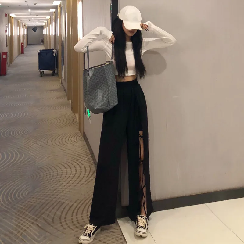 Женские повседневные брюки SHENGPALAE черные свободные с высокой талией и вырезами в