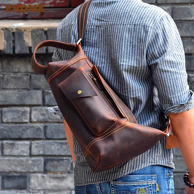 PNDME vintage genuine leather cylinder designer men chest bag outdoor motorcycle cowhide crossbody bag fashion shoulder bag