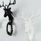 Вешалка настенная с несколькими крючками, в виде головы оленя