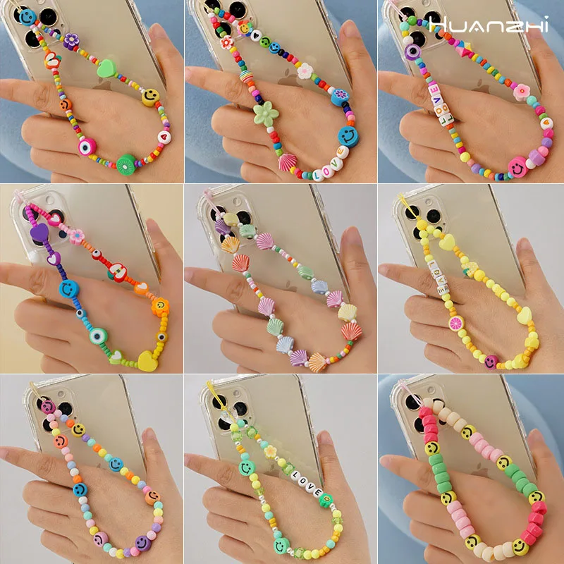 

HUANZHI 2021 Fashion Bohemian Style Colored Soft Clay Smiley Beads Letter LOVE Phone Chain for Ladies Girls Summer Party Jewelry