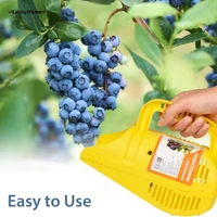 indispensable berry pi cker with plastic comb shaped for harvesting fruits