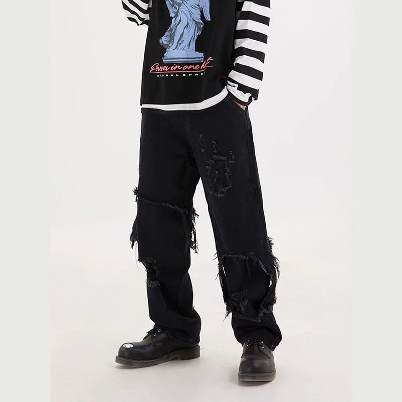 Рваные джинсы с асимметричными дырками широкими штанинами для мужчин и женщин