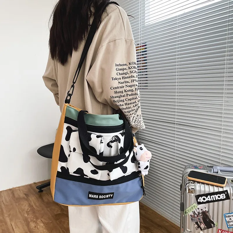 

2021 Summer Cute Cow Pattern Women's Messenger Bag Fashion Trend Large Capacity Waterproof Shoulder Bags Lightweight Handbags