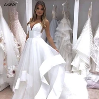 lorie sheer white boho wedding dresses spaghetti straps v neck backless princess bridal gowns with tiered ruffles skirt gown