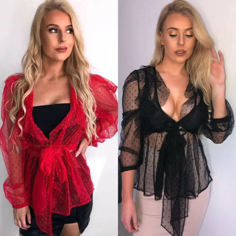 Женский купальный костюм с пышными рукавами и прозрачными сетчатыми пятнами