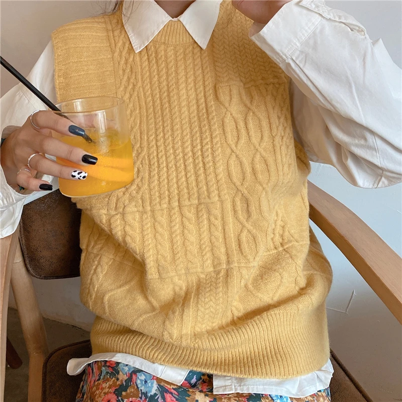 

2020 new knitted pullover waistcoat women's Korean vest wearing autumn winter college style irregular twist sweater