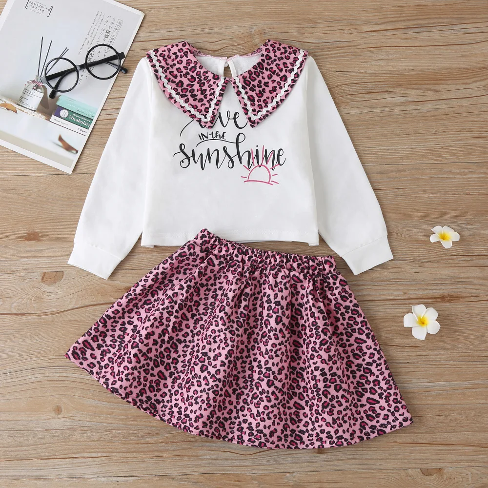 

Autumn 2021 New Arrivals Girls Casual Fashion Long Sleeve Letter Print Turn-down Collar Pink Leopard Print Skirt Suit 1-6T
