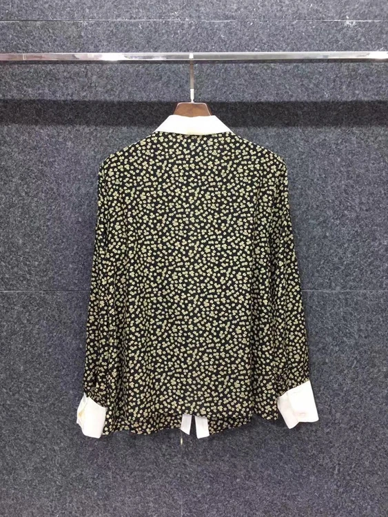 

2021 early spring new women's clothing leader mouth color matching wood ear print decoration long-sleeved all-match blouse 106