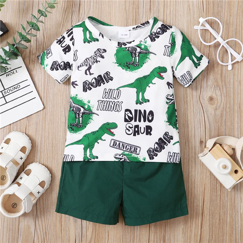 

Little Boy’s T-shirt and Shorts Set Cartoon Dinosaur Short Sleeve Tops and Solid Color Short Pants
