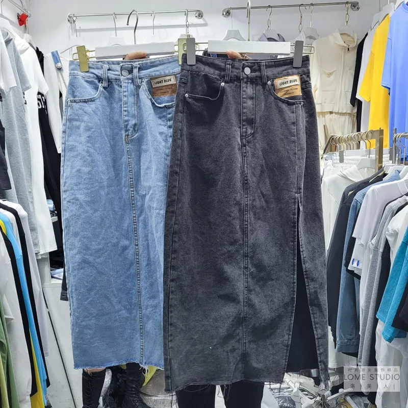 

Высокая талия ретро Разделение джинсовая юбка Для женщин 2021 Весна Новые Slim Хип посылка Mid Длина джинсовая юбка