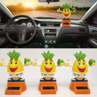 80 dropshippingsolar power cartoon swinging pineapple car interior ornament home decor toy gift