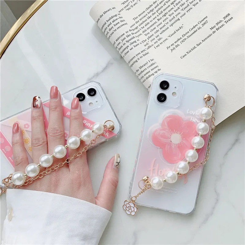 

Transparent Pink Flowers Blooming Pearl Wrist Straps phone case for iPhone 12 11 Pro Max X XR XS 7 8p Anti-fall back cover