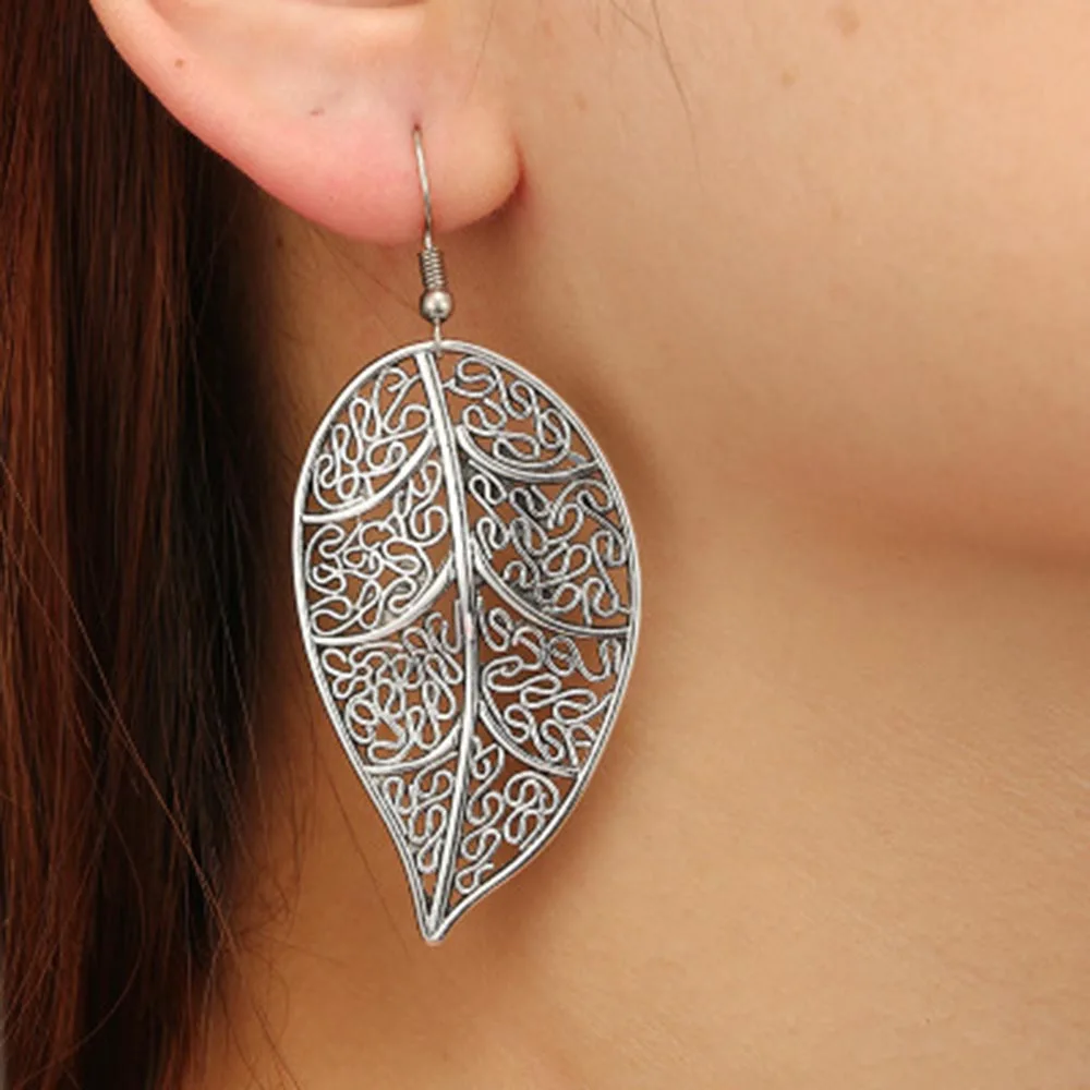 Длинные висячие серьги подвески с большими листьями золотого и серебряного