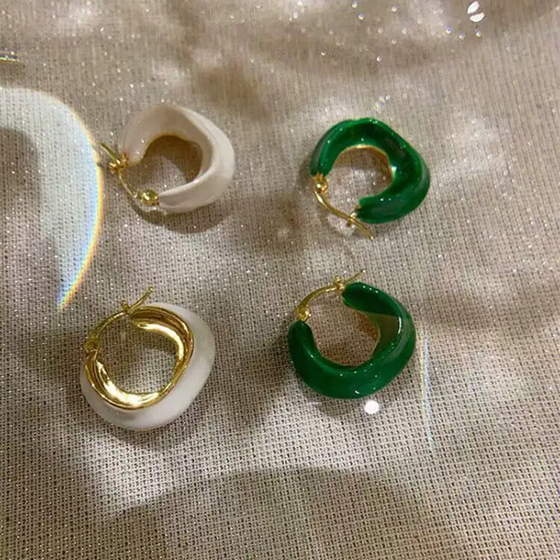 Женские ажурные серьги кольца металлические геометрические белого или зеленого