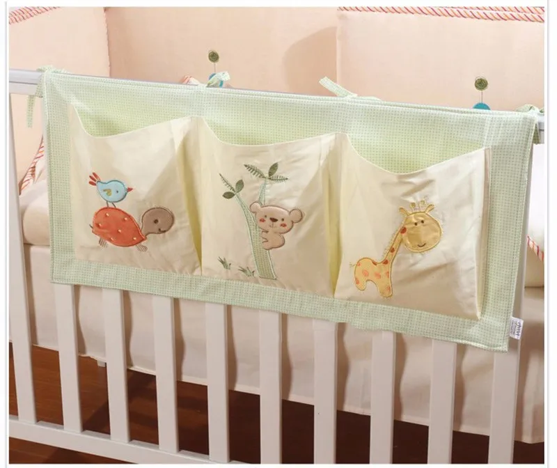 

Baby bumper Cotton Crib Organizer Baby Cot Bed Hanging Storage Bag Toy Diaper Pocket for Newborn Crib Bedding Set Accessories