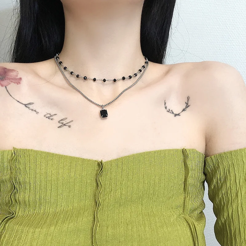 

Двухслойное обсидиановое ожерелье с цепочкой до ключиц из титановой стали