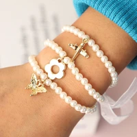 south koreas fashion sweet simple multi layer pearl airplane flower butterfly bracelet combination hand ornament for women girl