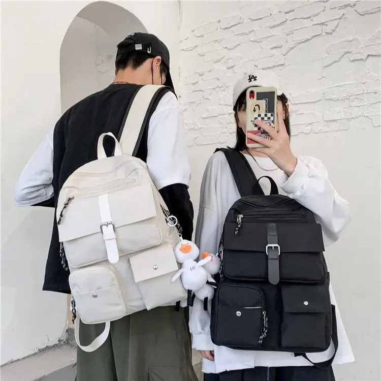 

College style simple design versatile male and female students schoolbag solid color backpack large capacity travel bag