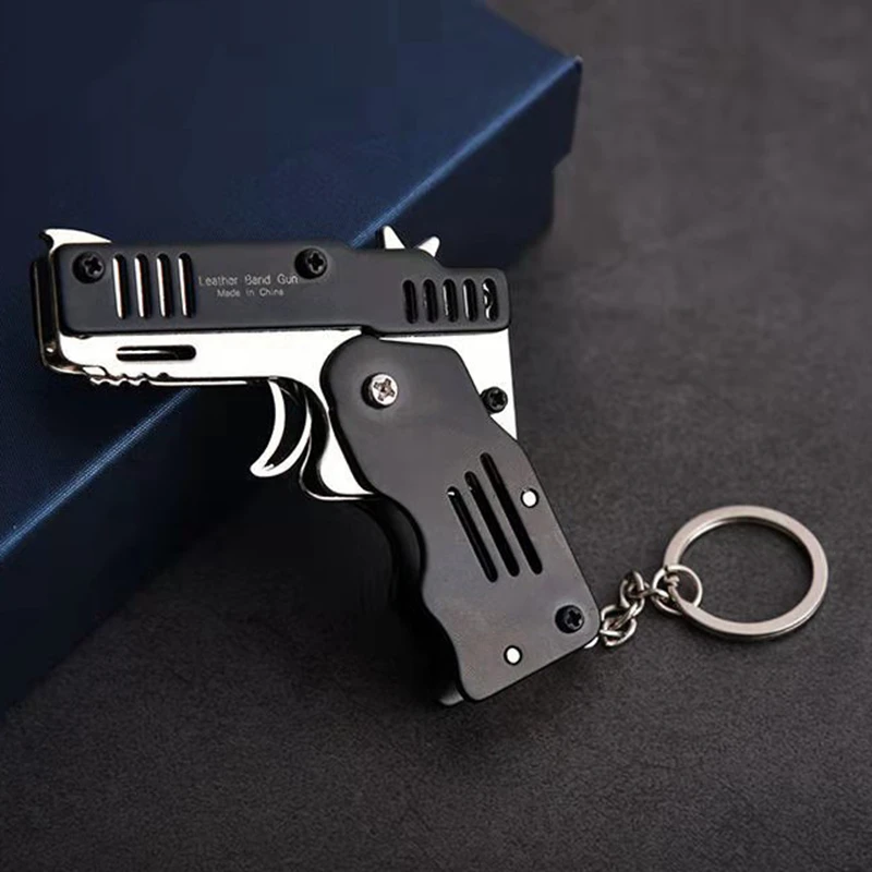 

Mini Folding Outdoor tools Can Hold The Key Chain Of Launch rubber band Folding Toy Gifts Boys