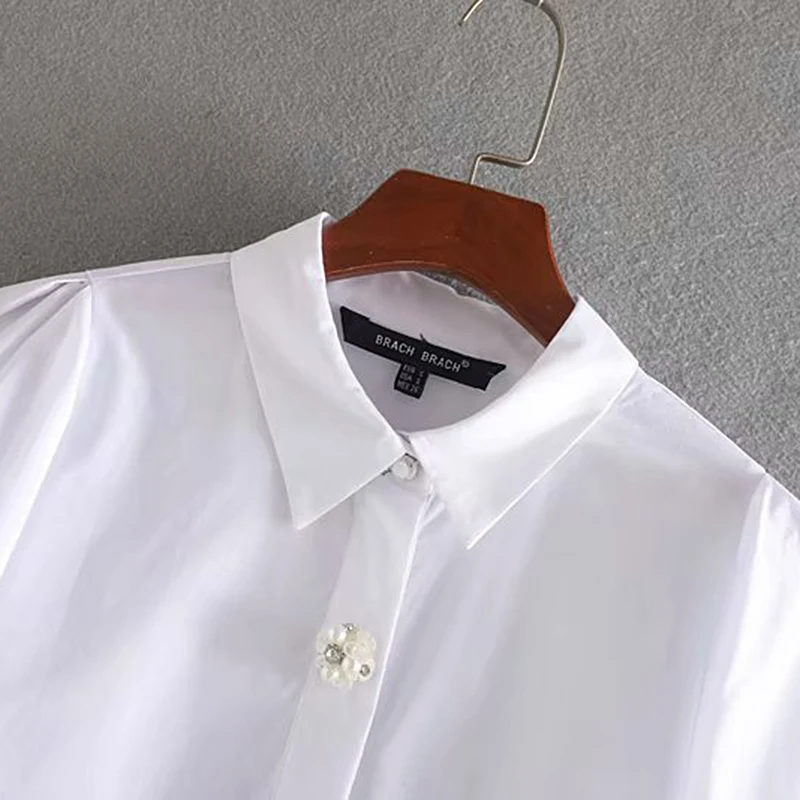 

Women Casual Vintage White Pearl Buttons Loose Blouses Lapel Collar Long Sleeve Ladies Shirts Casual Blusas Mujer 2020 Fashion