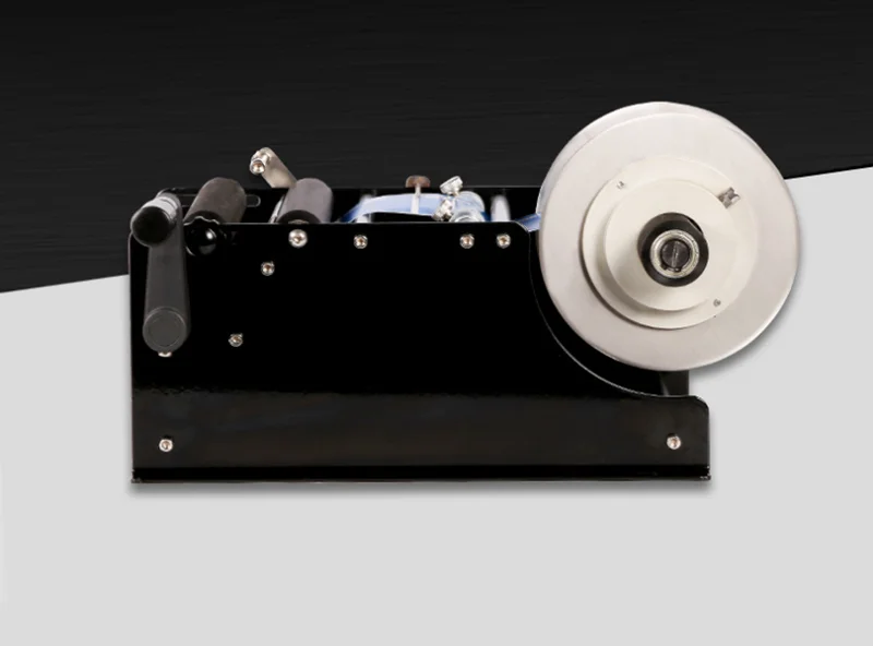 Пластиковая мини машина для упаковки бутылок простая ручная нанесения этикеток