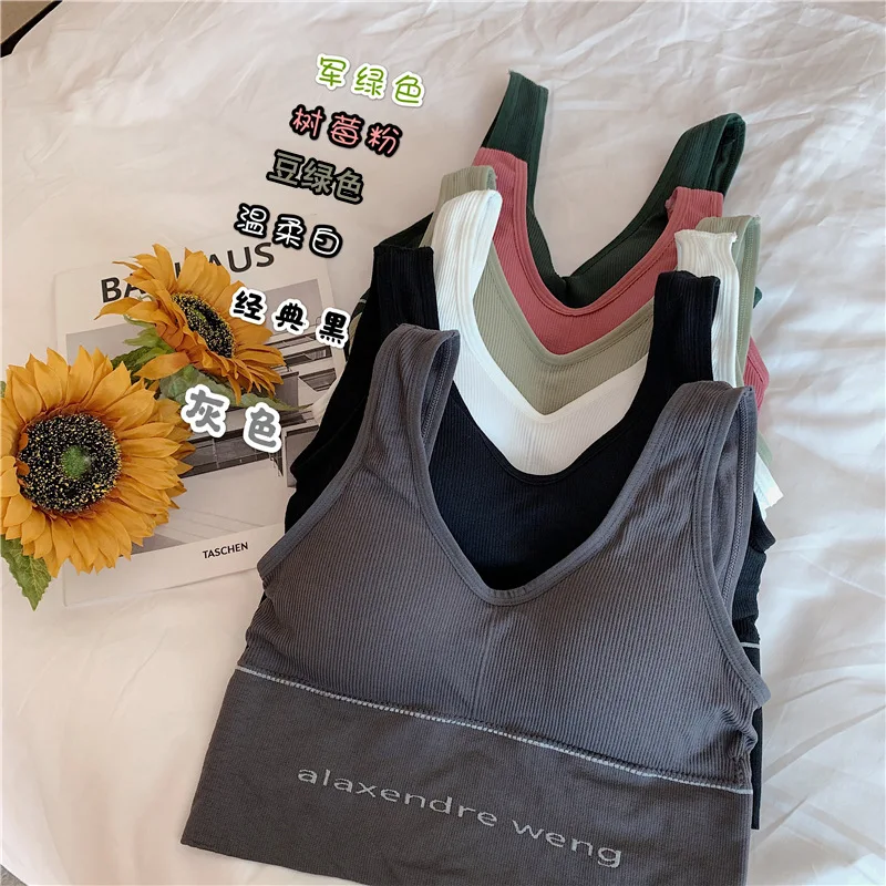 U-shaped sport vests with halter back worn under a strapless jacket | Спорт и развлечения