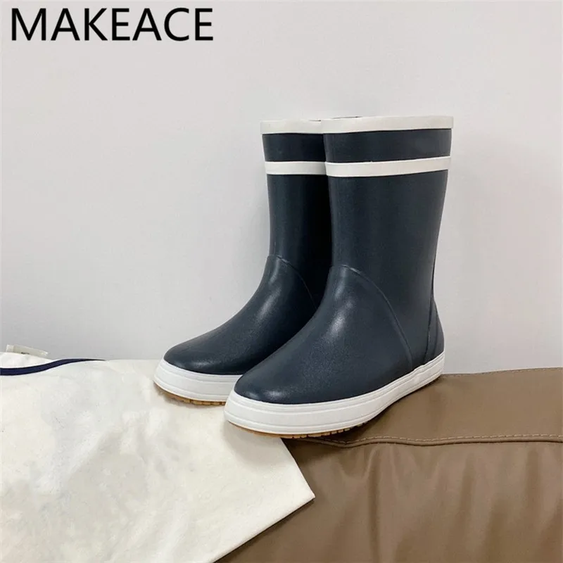 

New Pvc thick sole Rain boots Women round toe rubber waterproof mid calf botas Female autumn fashion short boots Runway shoes