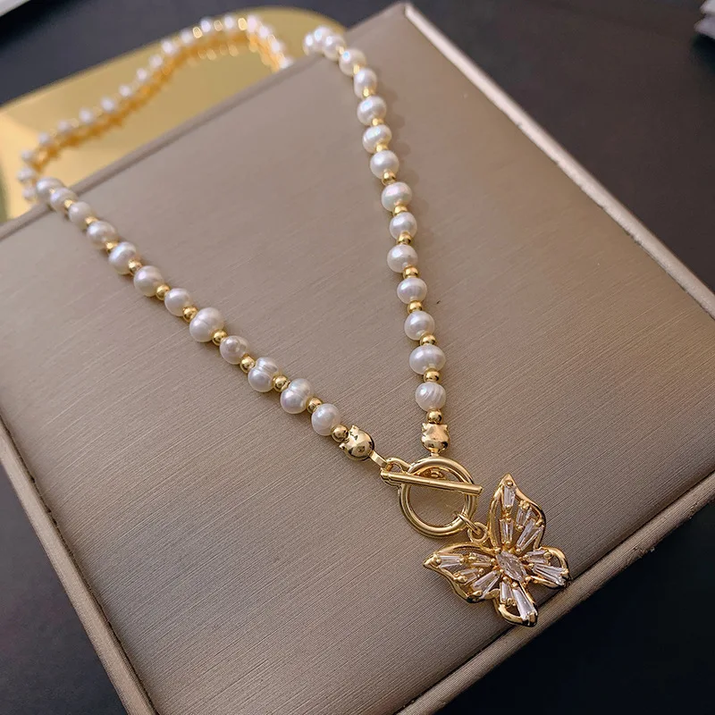 

Ожерелье из натурального пресноводного жемчуга, подвеска-цепочка с бабочкой, инкрустированная цирконием, женское жемчужное ожерелье, иску...