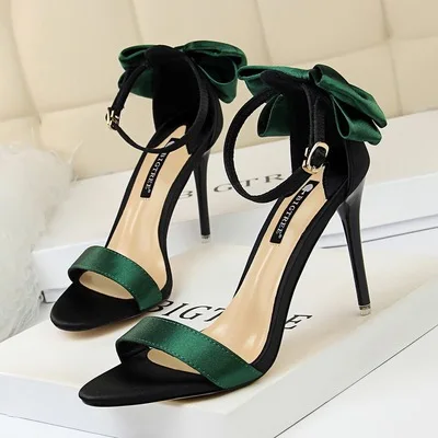 

Korean fashion sweet high-heeled shoes women's shoes stiletto high-heeled silk and satin color matching word with bow sandals
