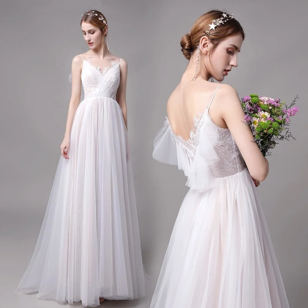 

Luxurious quality temperament simple banquet white long suspender dress fashion sexy slim backless V-neck wedding dress real
