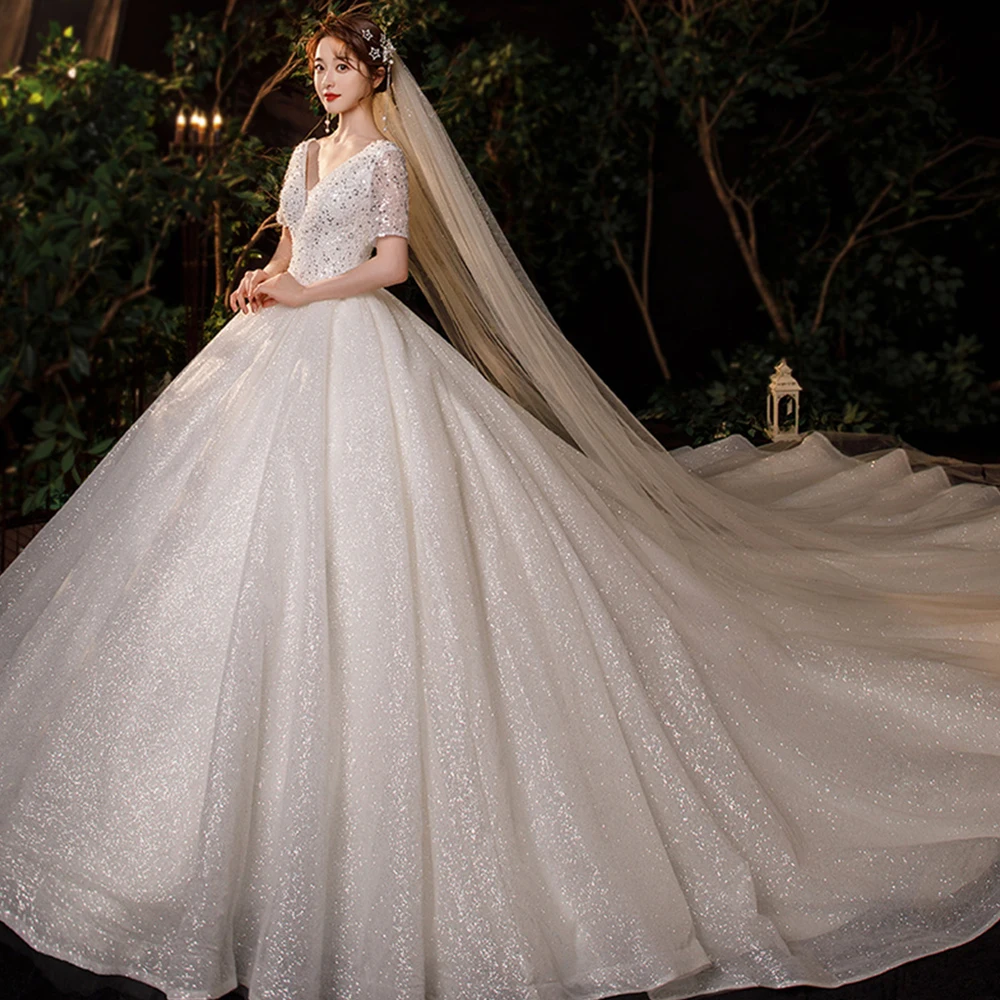 

Dioflyusa Sequins V Neck Slim A-line Wedding Dress Women Tulle Short Slevee Backless Lace Up Bride Long Gown Vestido De Noiva
