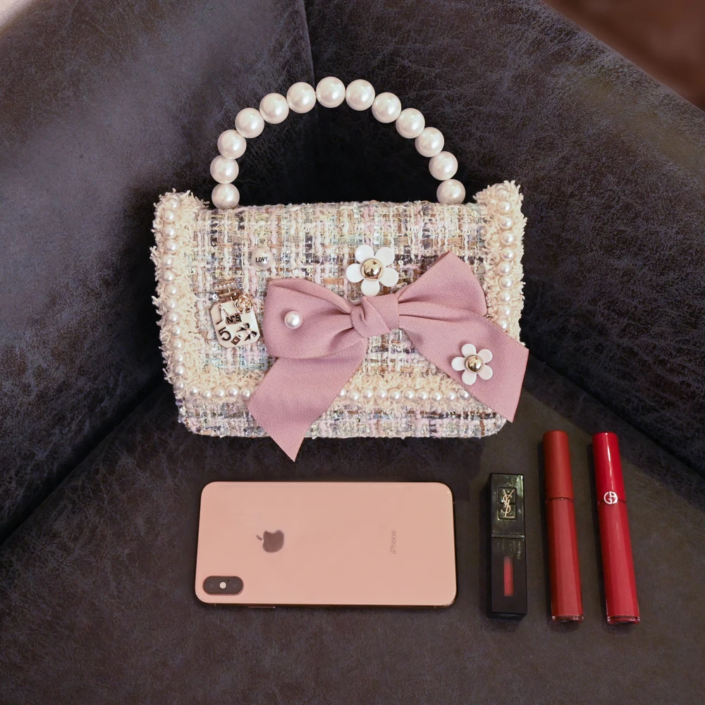 Редкие повседневные сумочки с креативным бантиком украшенные жемчугом высокое